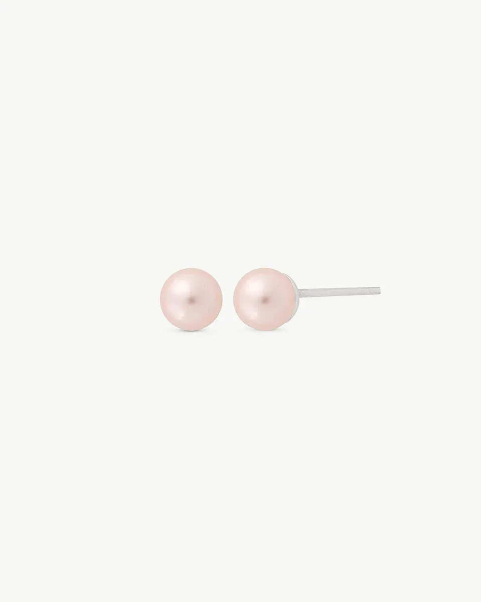 Front and side view of pink pearl stud earrings on a white background, showing the silver post.