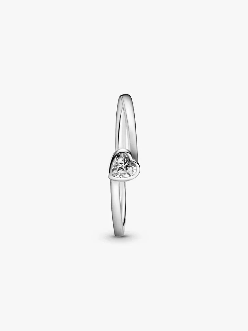 Silver ring with heart-shaped stone shown from a side profile view, plain white background.