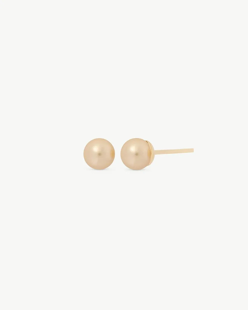 Front view of pearl stud earrings on a white background, showing the side profile of the post.