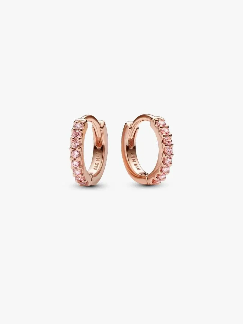 Pair of pink cubic zirconia hoop earrings, front view on a pure white background.