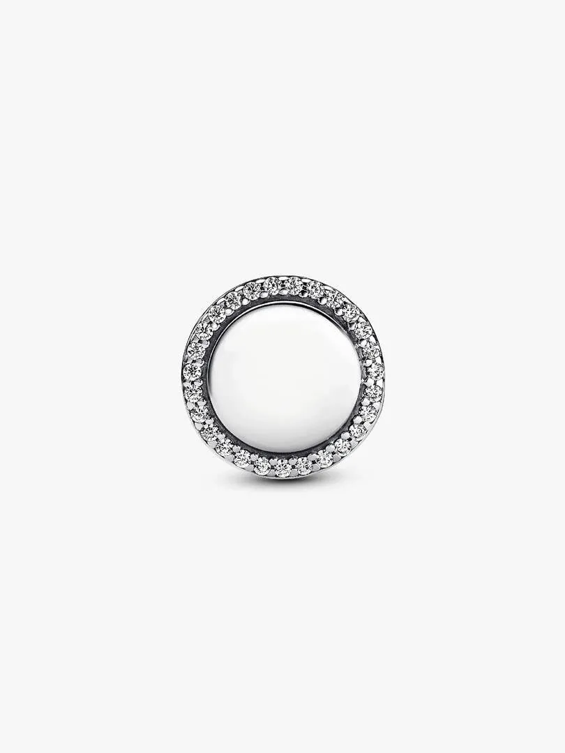 Front view of a circular charm with cubic zirconia pavé, neutral white background.