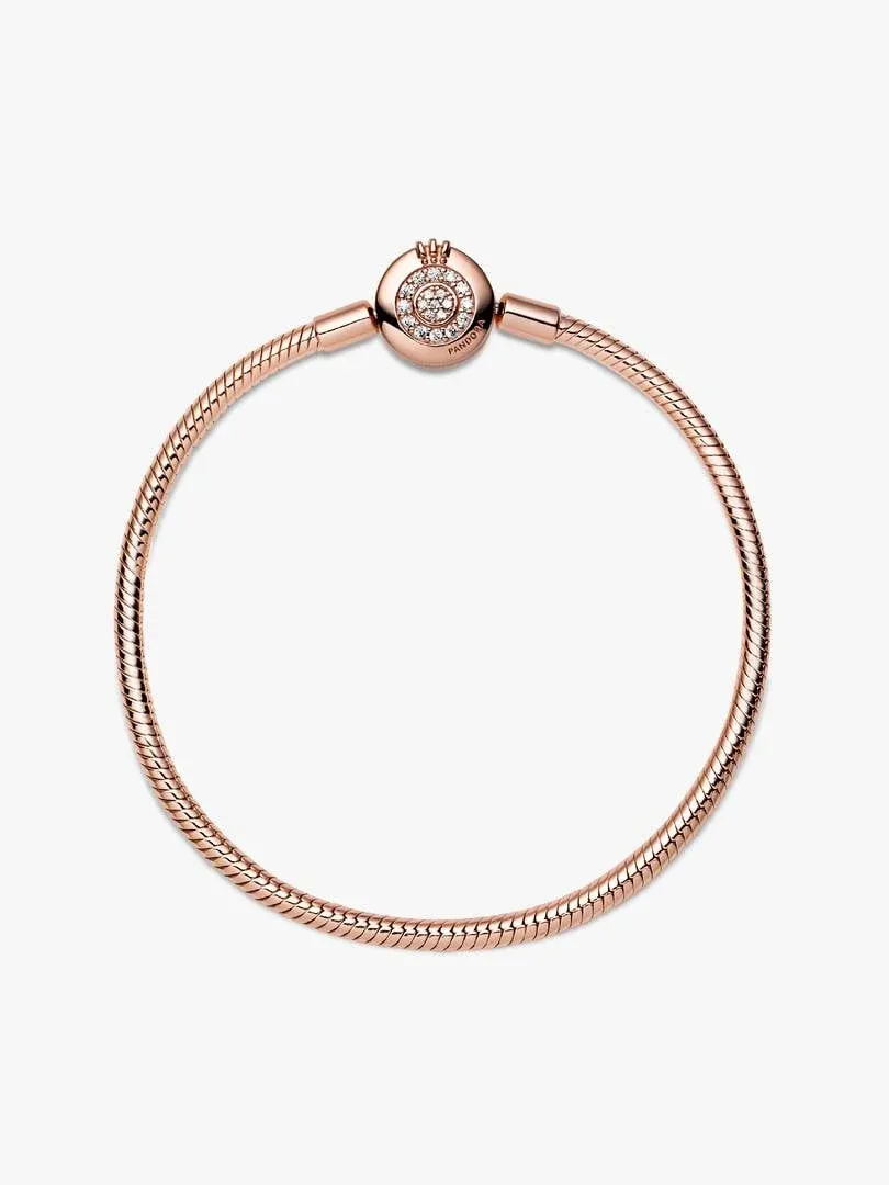 Front view of snake chain bracelet on white background, focusing on the pavé stone circular clasp.