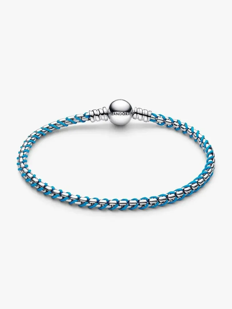 Front view of the box chain bracelet with blue cord, displayed on a white background.