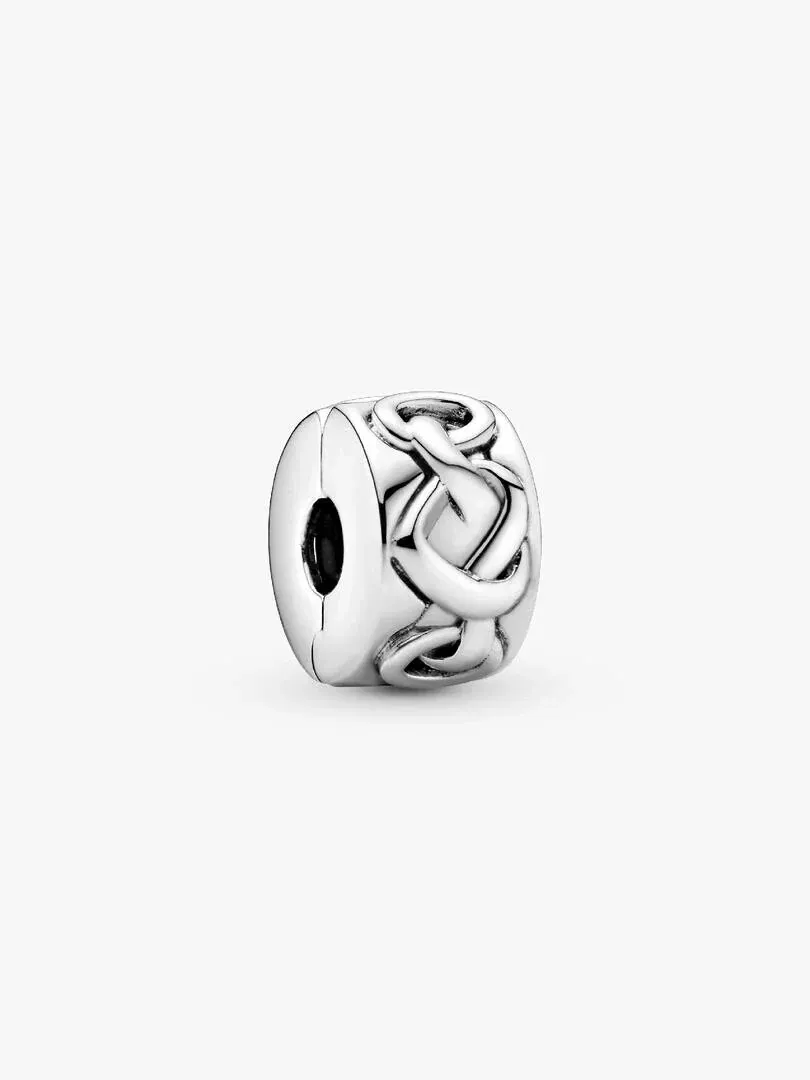 Clip charm with intertwined heart design, side angle view, isolated on pure white background.