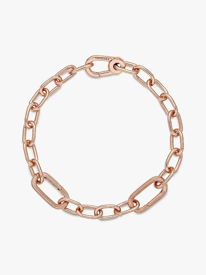 Pulsera de eslabones dispuesta en círculo sobre fondo blanco, vista cenital con acabado en oro rosa.