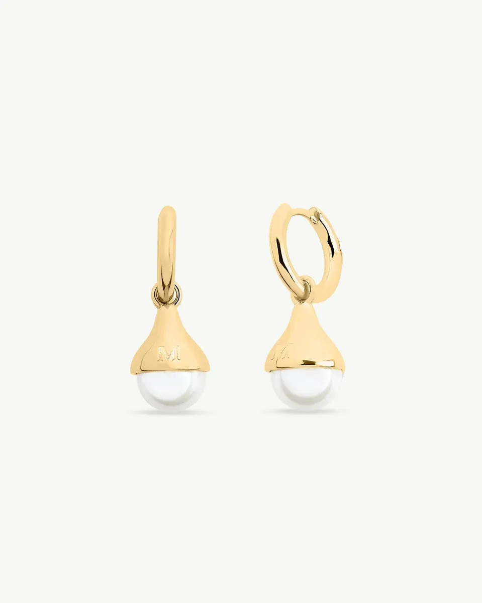 Front view of hoop earrings with drop pearl, white background, symmetrical shot.
