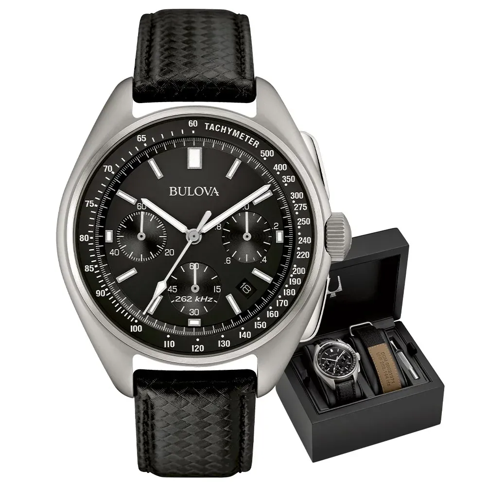 Vista frontal del reloj sobre fondo blanco, acompañado de su estuche de presentación negro.