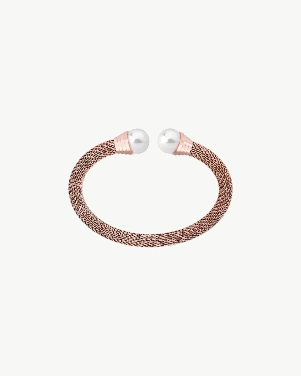 Rose gold steel bangle with white pearls, front view on a white background.