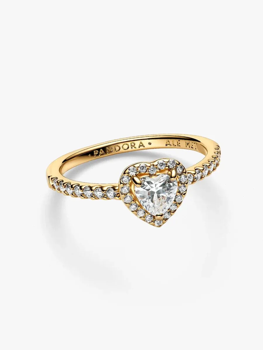 Heart ring shown from a side angle, featuring pavé stones on the band, white background.