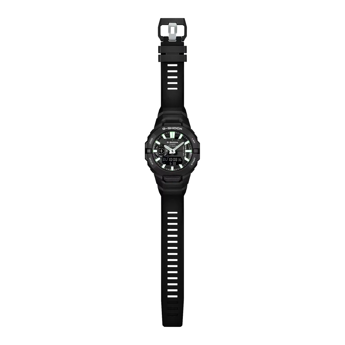 Vista frontal completa del reloj con correa, centrado sobre un fondo dividido en negro y blanco.