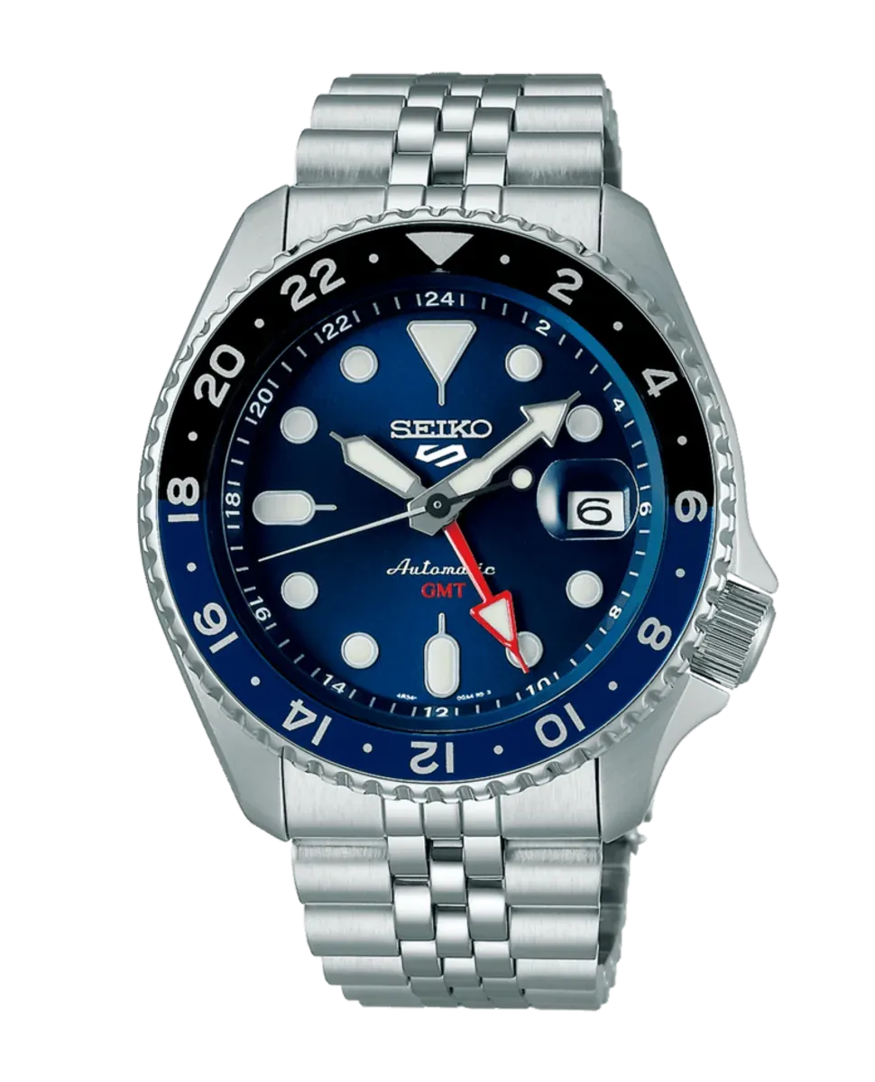 Vista frontal completa del reloj con esfera azul y brazalete de acero sobre fondo blanco
