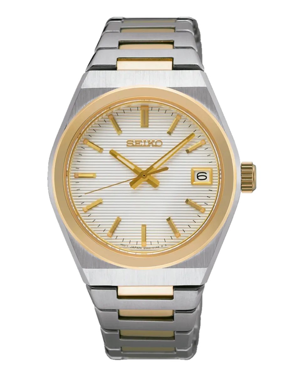 Vista frontal completa del reloj sobre fondo blanco, caja plateada con bisel dorado y brazalete bicolor.