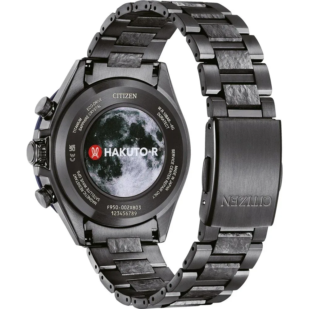 Rear view of the watch on a white background, highlighting the case back with moon illustration and the clasp.