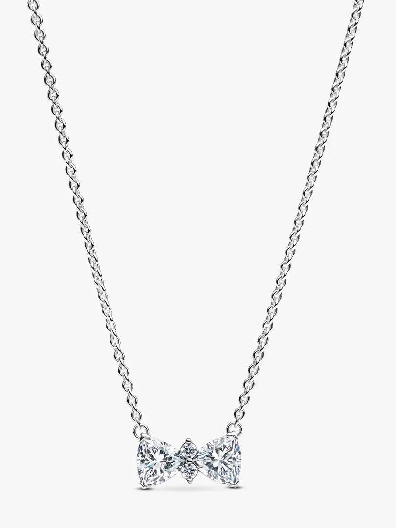 Bow pendant necklace with cubic zirconia on a white background, centered front view.