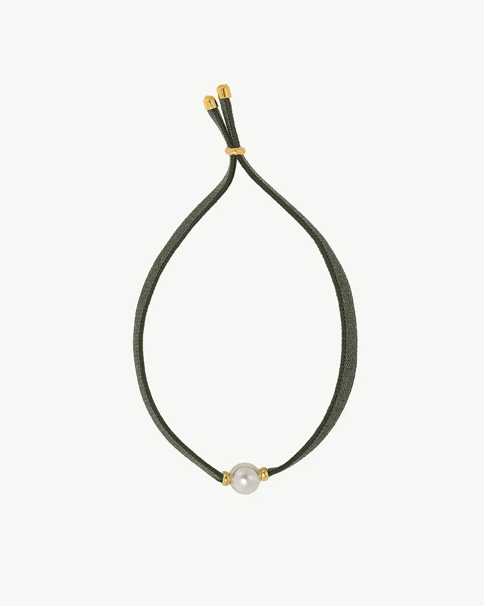 Olive green cord bracelet with a central white pearl, front view on a white background.
