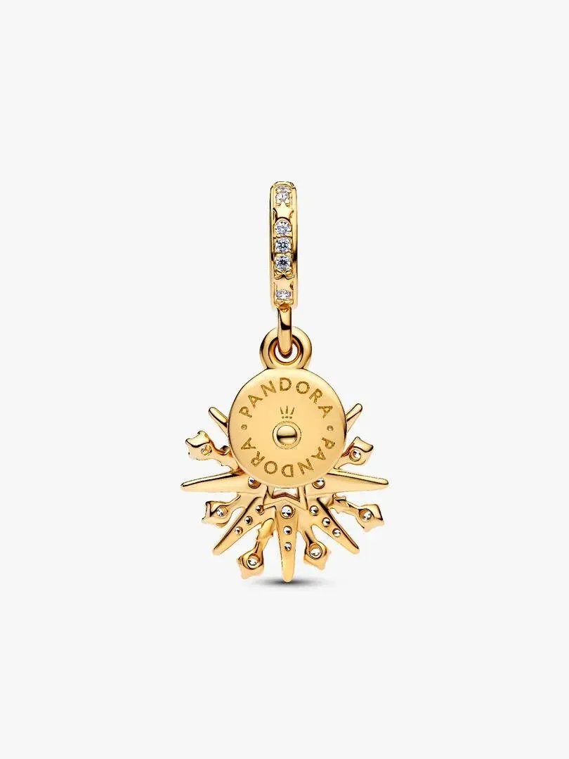 Gold-tone charm pendant with firework design and cubic zirconia, front view on a white background.