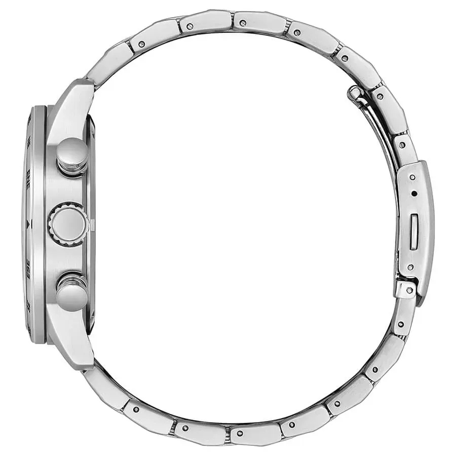 Vista de perfil del reloj sobre fondo blanco, destacando la corona, los pulsadores y el brazalete de acero.