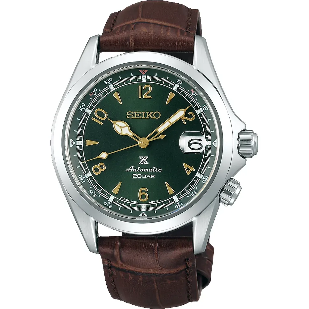 Vista frontal completa del reloj con esfera verde y correa de cuero marrón sobre fondo blanco
