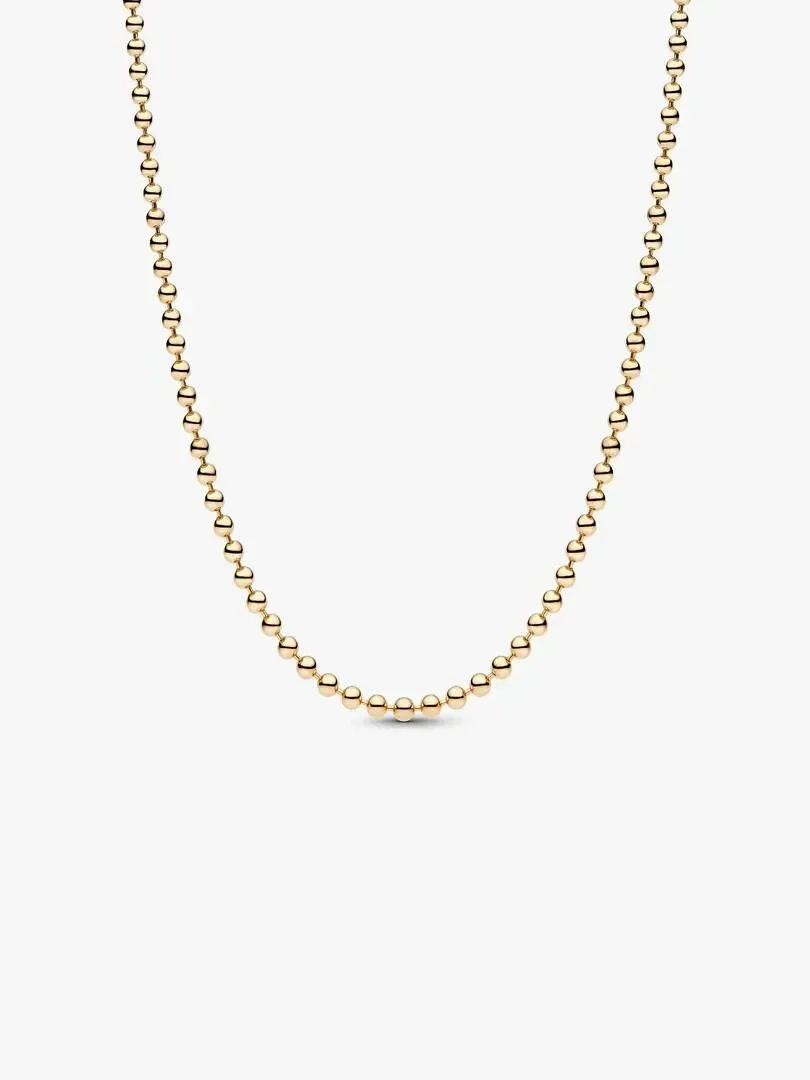 Goldenes Perlenhalsband in U-Form auf weißem Hintergrund, vollständige Frontalansicht.