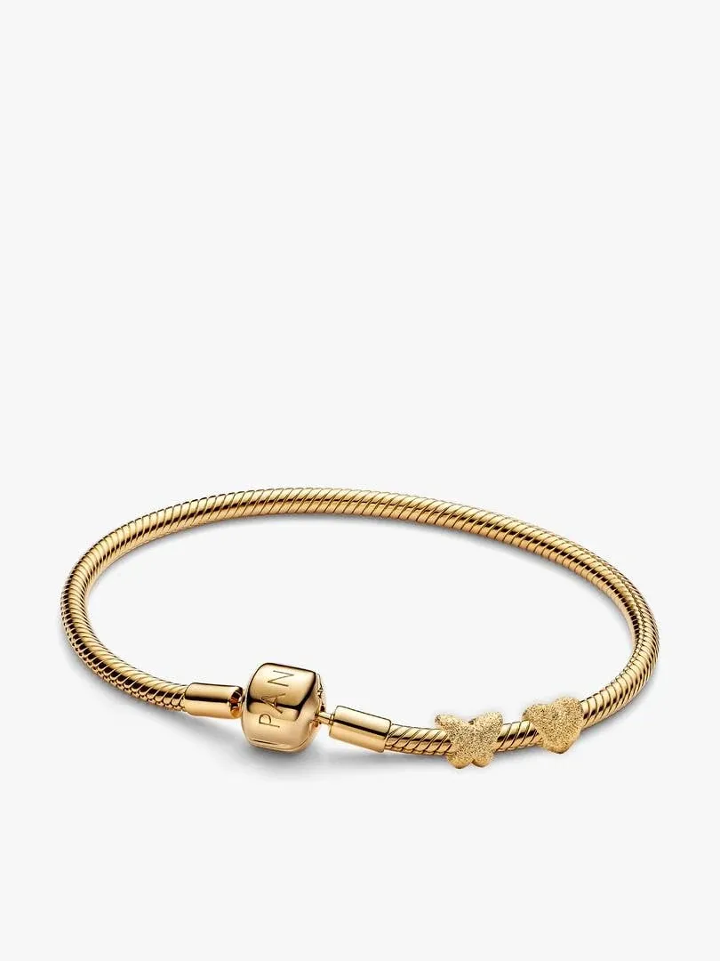 Snake chain bracelet with butterfly and heart charms, front view on a white background.