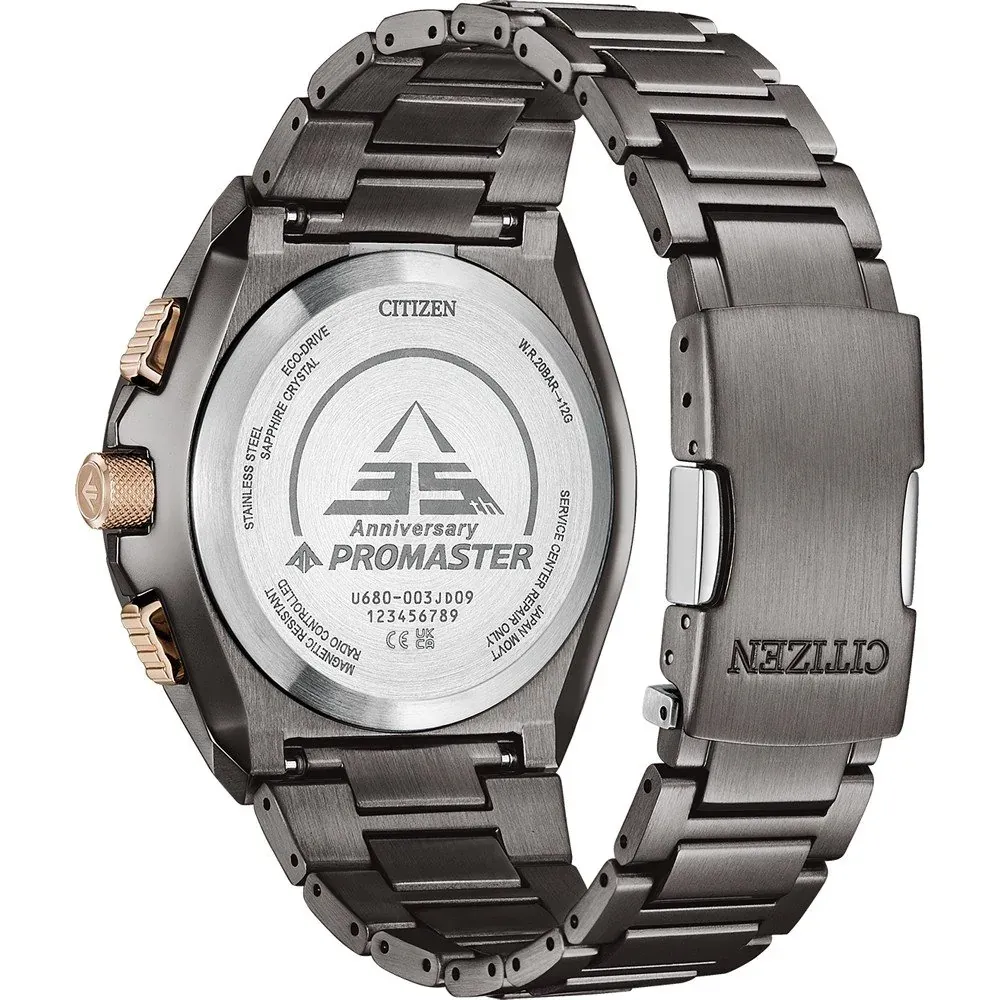 Rear view of the watch on white background, detail of the screw-down case back with engravings and bracelet.