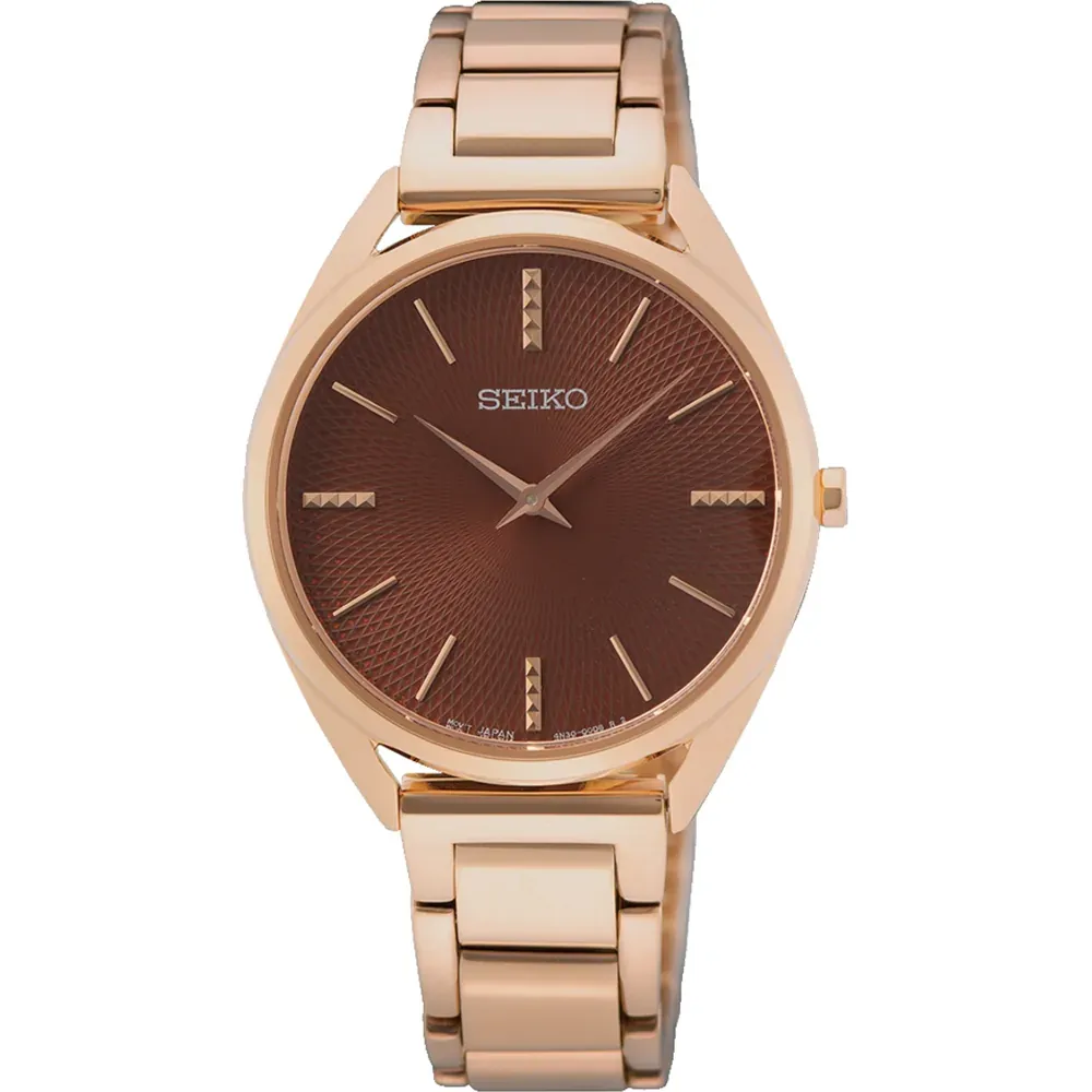 Front view of the watch with rose gold case and bracelet and brown dial, on white background