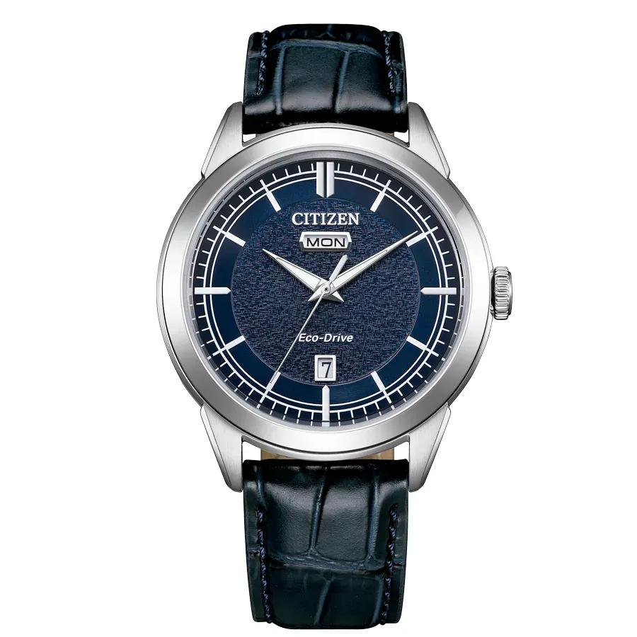 Vista frontal completa del reloj con esfera azul y correa de piel, fondo blanco.