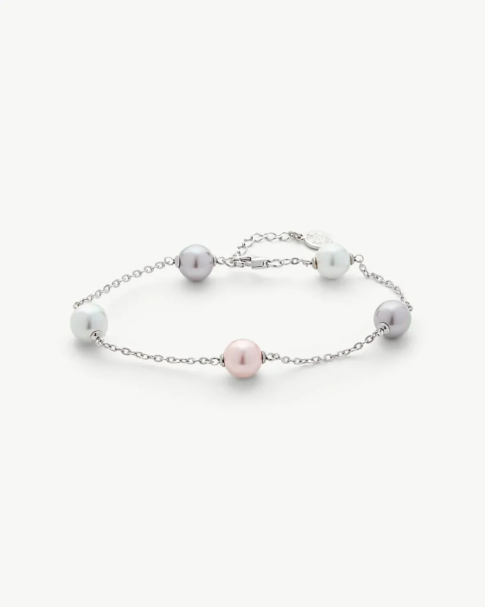 Pearl bracelet arranged in a circle on a white background, front view showing the lobster clasp detail.