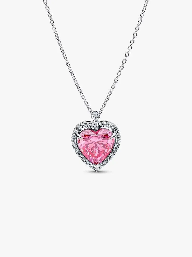 Heart pendant necklace with pink stone and halo, front view on a white background.