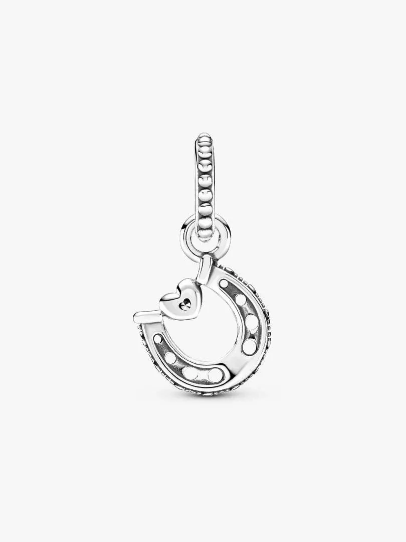 Front view of the silver horseshoe charm, slightly high angle, isolated on a pure white background.