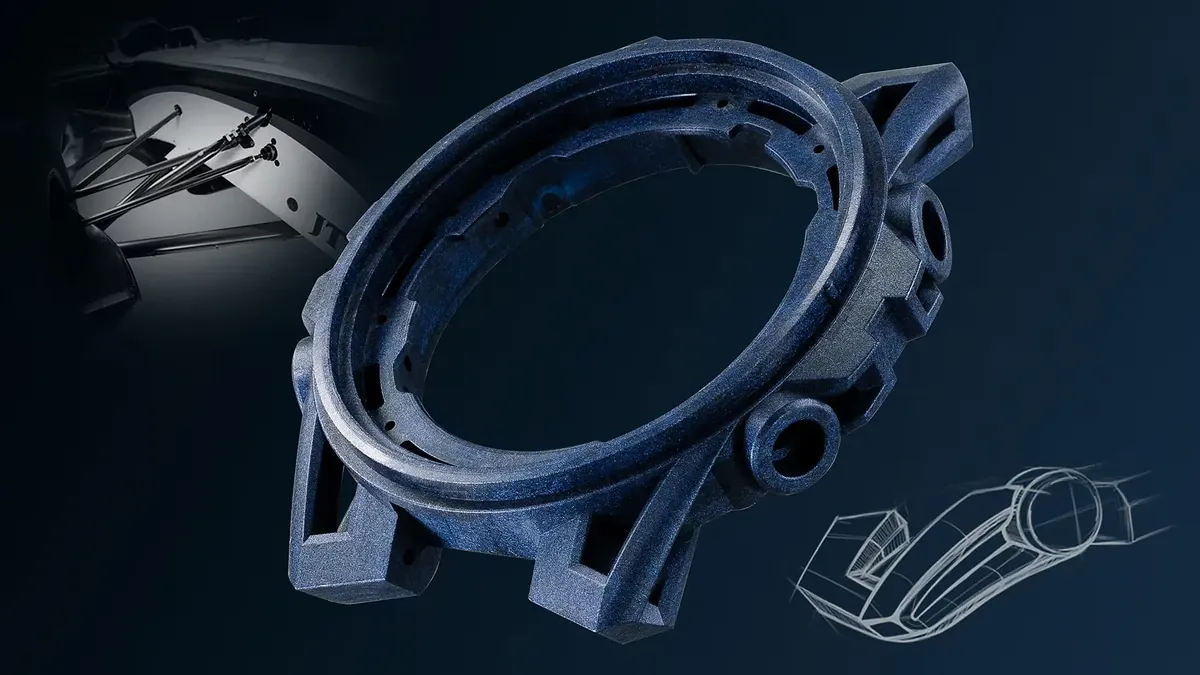 Detalle en perspectiva de la caja de resina azul, fondo oscuro con esquema técnico y fragmento de coche.