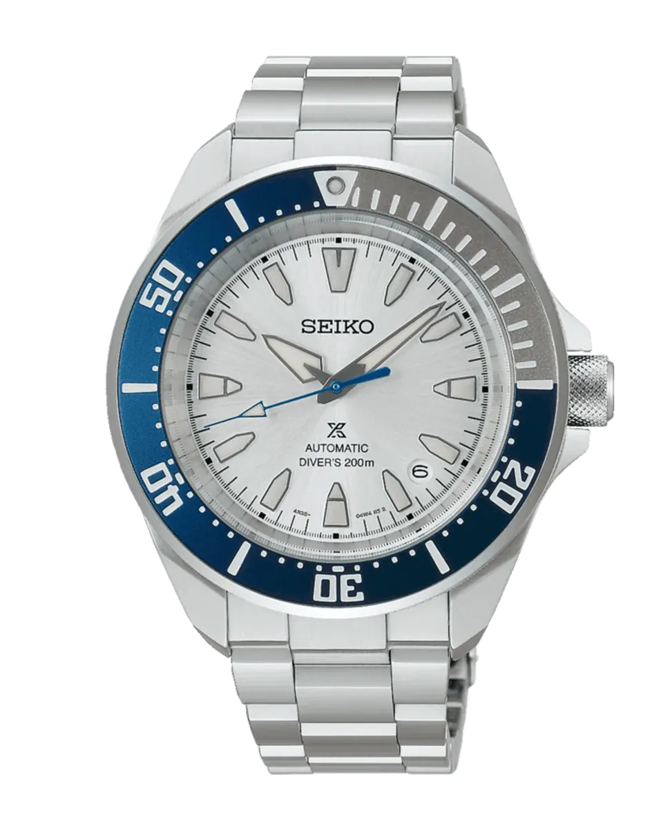 Vista frontal completa del reloj con bisel azul y esfera blanca, fondo blanco neutro.