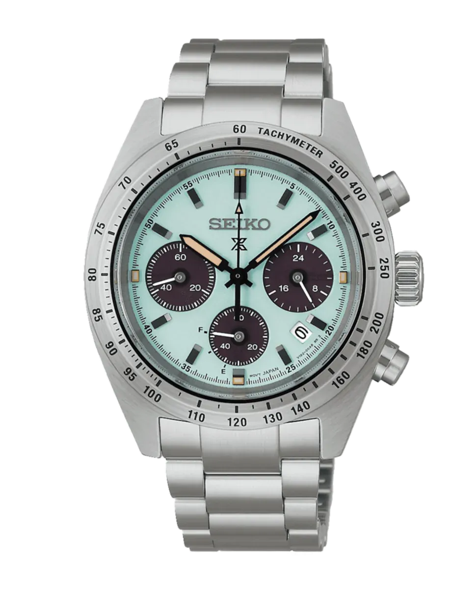 Vista frontal completa del reloj sobre fondo blanco, destacando la esfera verde menta y el brazalete de acero.