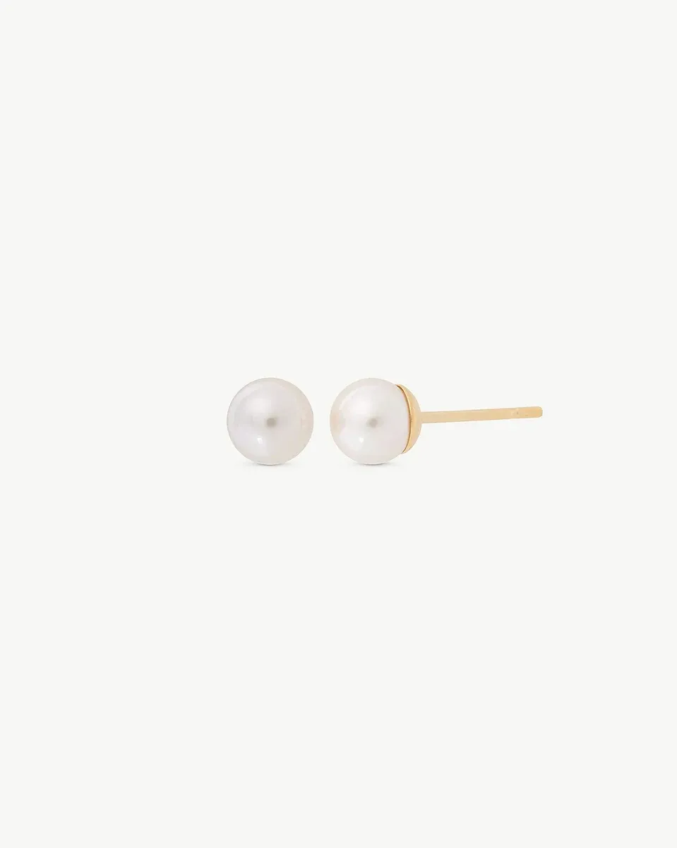 Pair of pearl stud earrings shown front and profile view on a pure white background.
