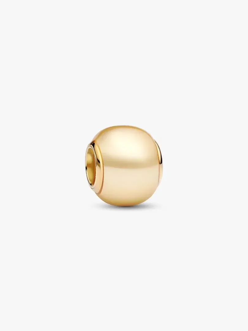 Golden spherical charm shown from the front, centered shot on a pure white background.