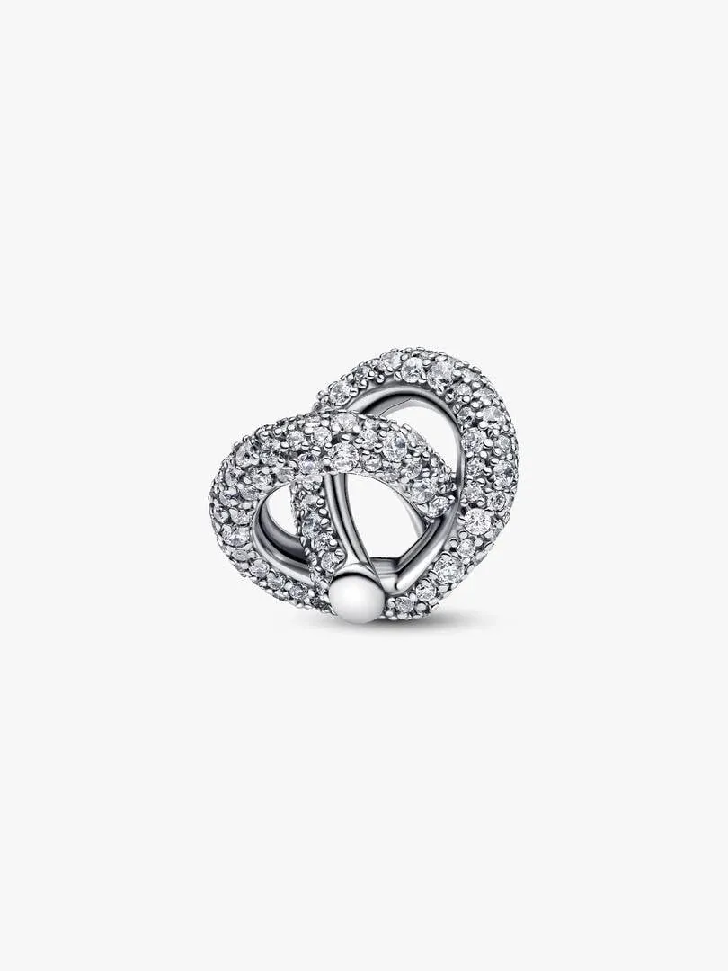 Heart knot infinity charm, front angled view, pavé setting on white background.