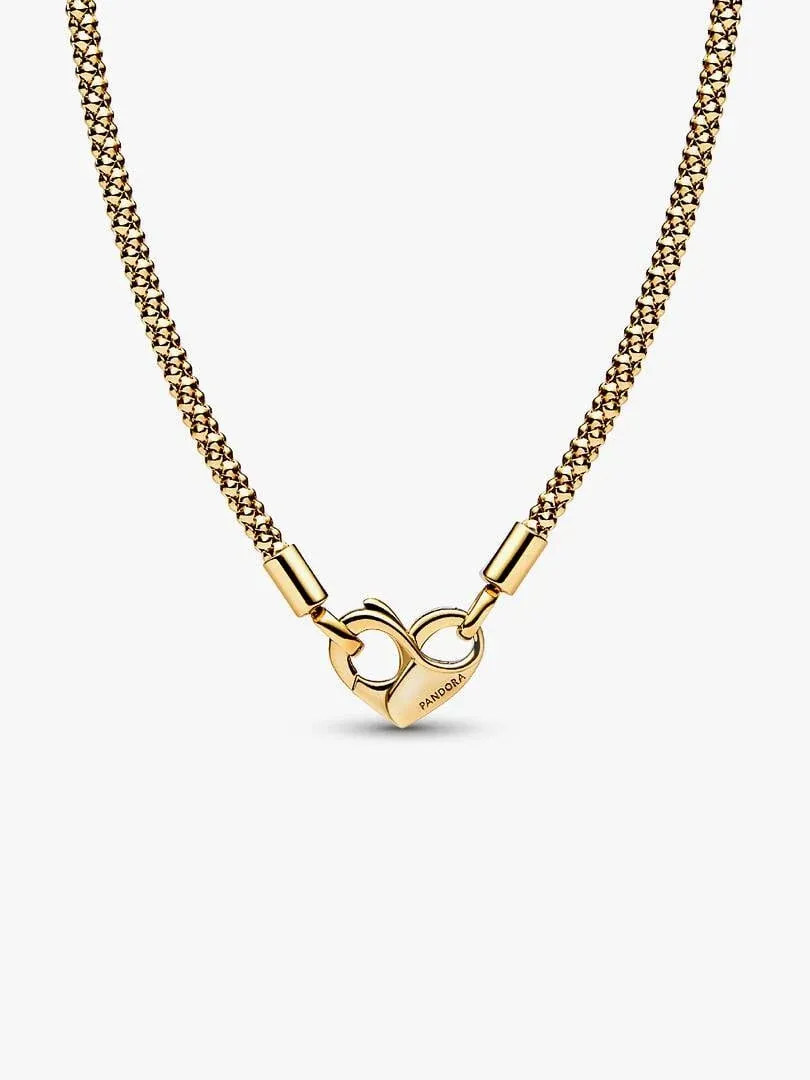 Gold chain necklace with heart-shaped clasp, front view on a white background.