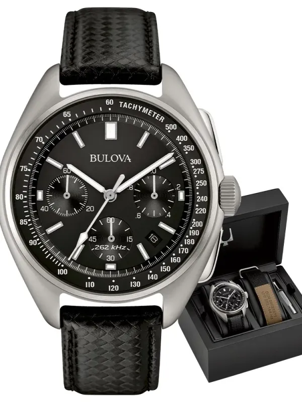 Vista frontal del reloj sobre fondo blanco, acompañado de su estuche de presentación negro.