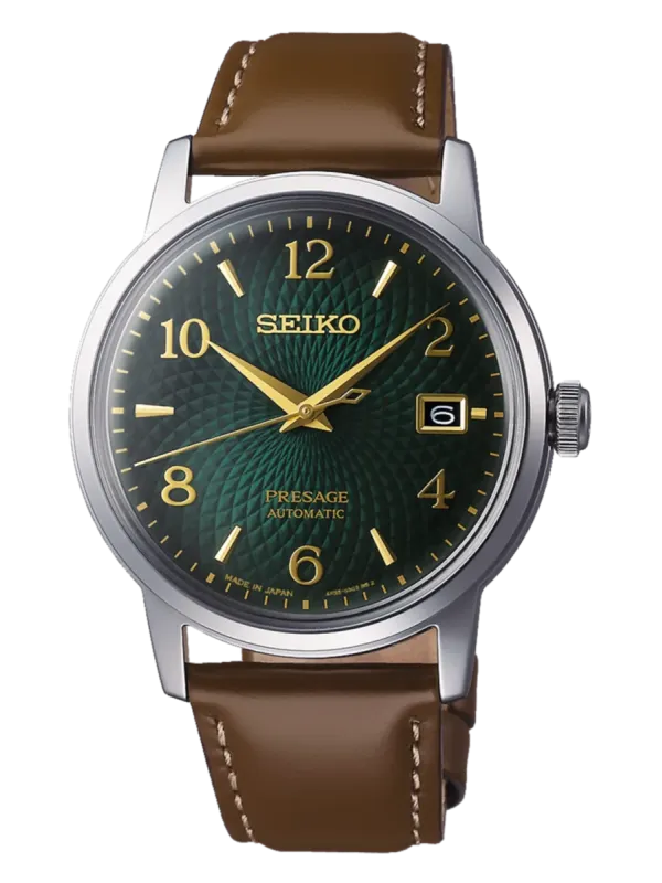 Vue de face complète de la montre sur fond blanc, avec cadran vert texturé et bracelet en cuir marron.