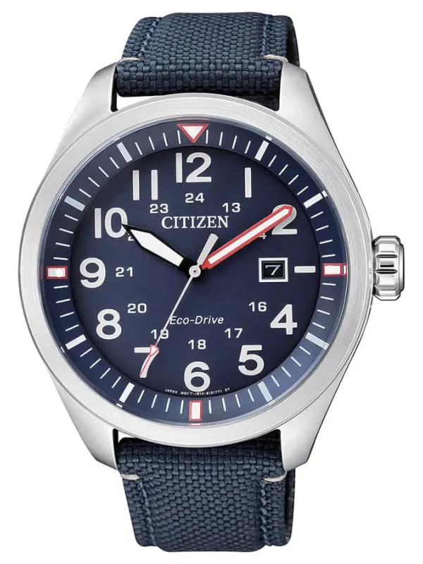 Vista frontal completa del reloj, esfera azul y correa textil, fondo blanco.