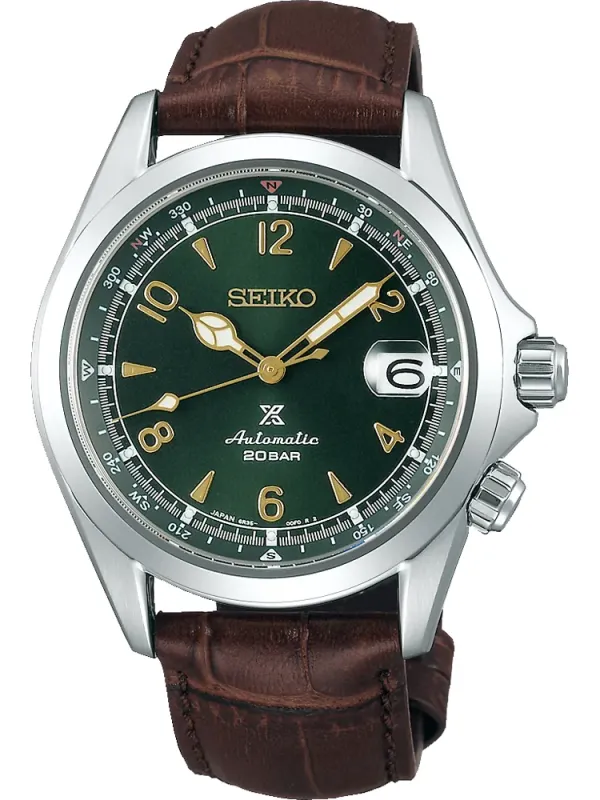 Vue de face complète de la montre avec cadran vert et bracelet en cuir marron sur fond blanc