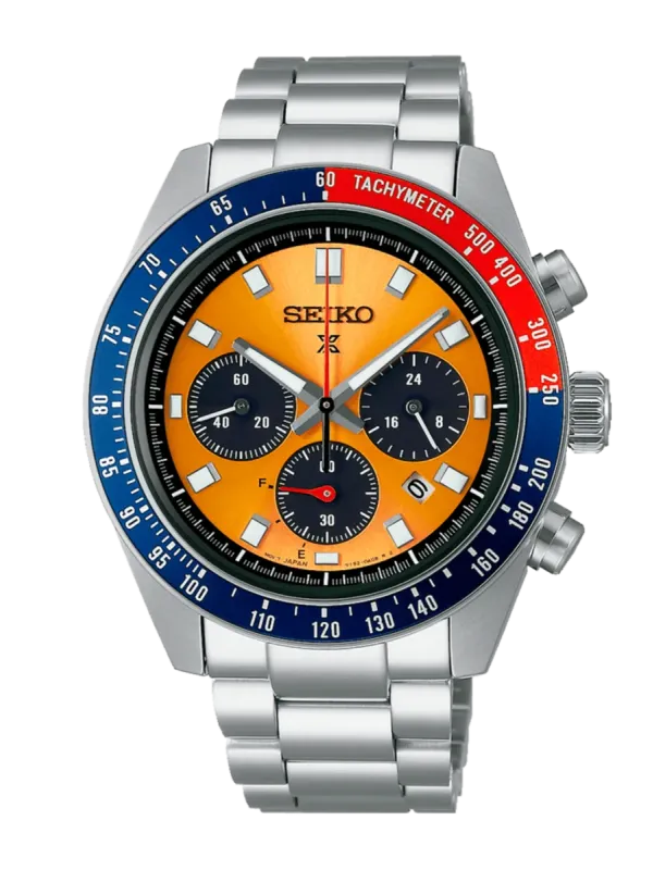 Vista frontal del reloj sobre fondo blanco, destacando la esfera naranja y el bisel taquimétrico bicolor.