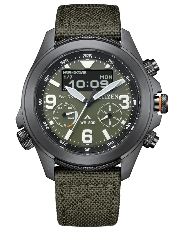 Vue de face centrée de la montre sur fond blanc, mettant en valeur le cadran vert et le bracelet en nylon.