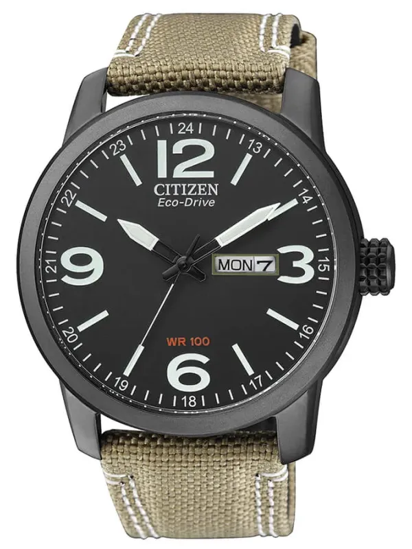Vista frontal completa del reloj sobre fondo blanco, destacando la esfera negra y la correa de nylon.