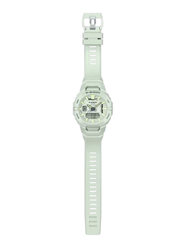Vista frontal completa del reloj blanco, incluyendo la correa y hebilla, sobre fondo blanco.