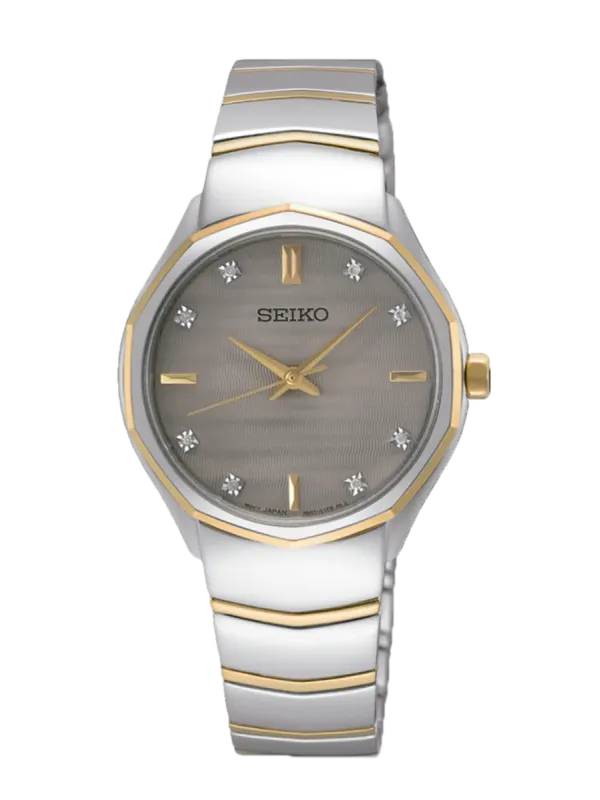 Vista frontal completa del reloj sobre fondo blanco, brazalete y caja en acero bicolor plata y oro.