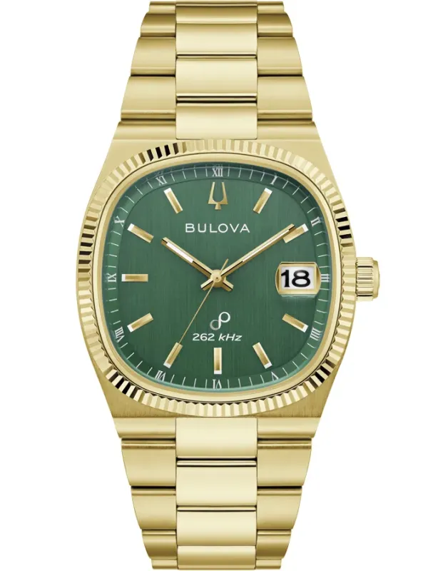 Vista frontal completa del reloj con caja y brazalete chapado en oro, esfera verde, sobre fondo blanco.