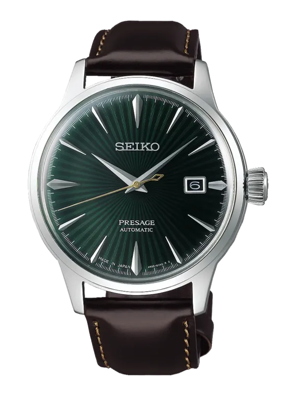 Vista frontal completa del reloj sobre fondo blanco, destacando la esfera verde radial y la correa de cuero marrón.