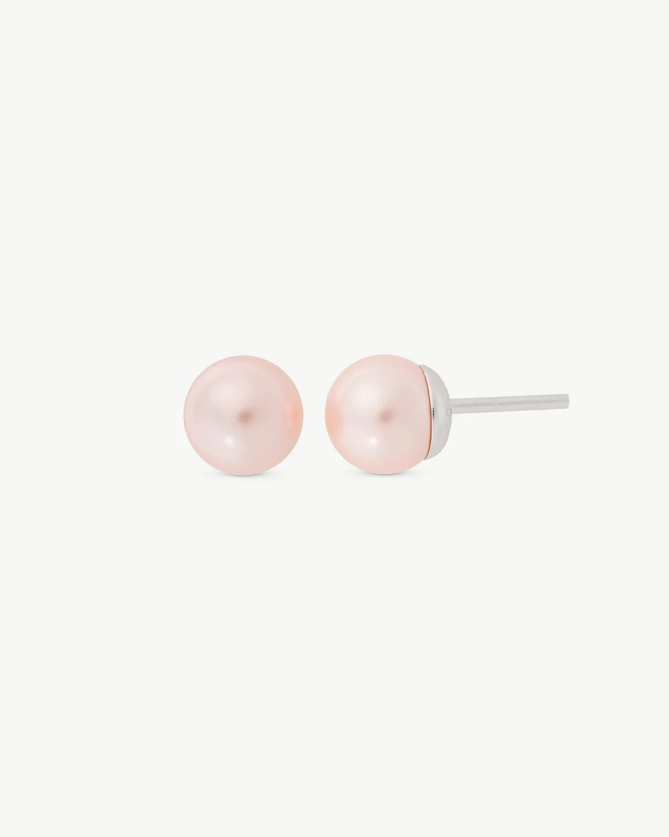 Front view of pink pearl stud earrings on a white background, showing the silver post.