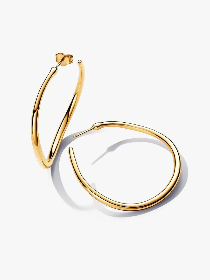 Gold organic-shaped hoop earrings, side and front view on a white background with soft shadows.
